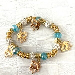 Bracelet unicorn turquoise beads. Fits wrist up to 8 inches. NWT
